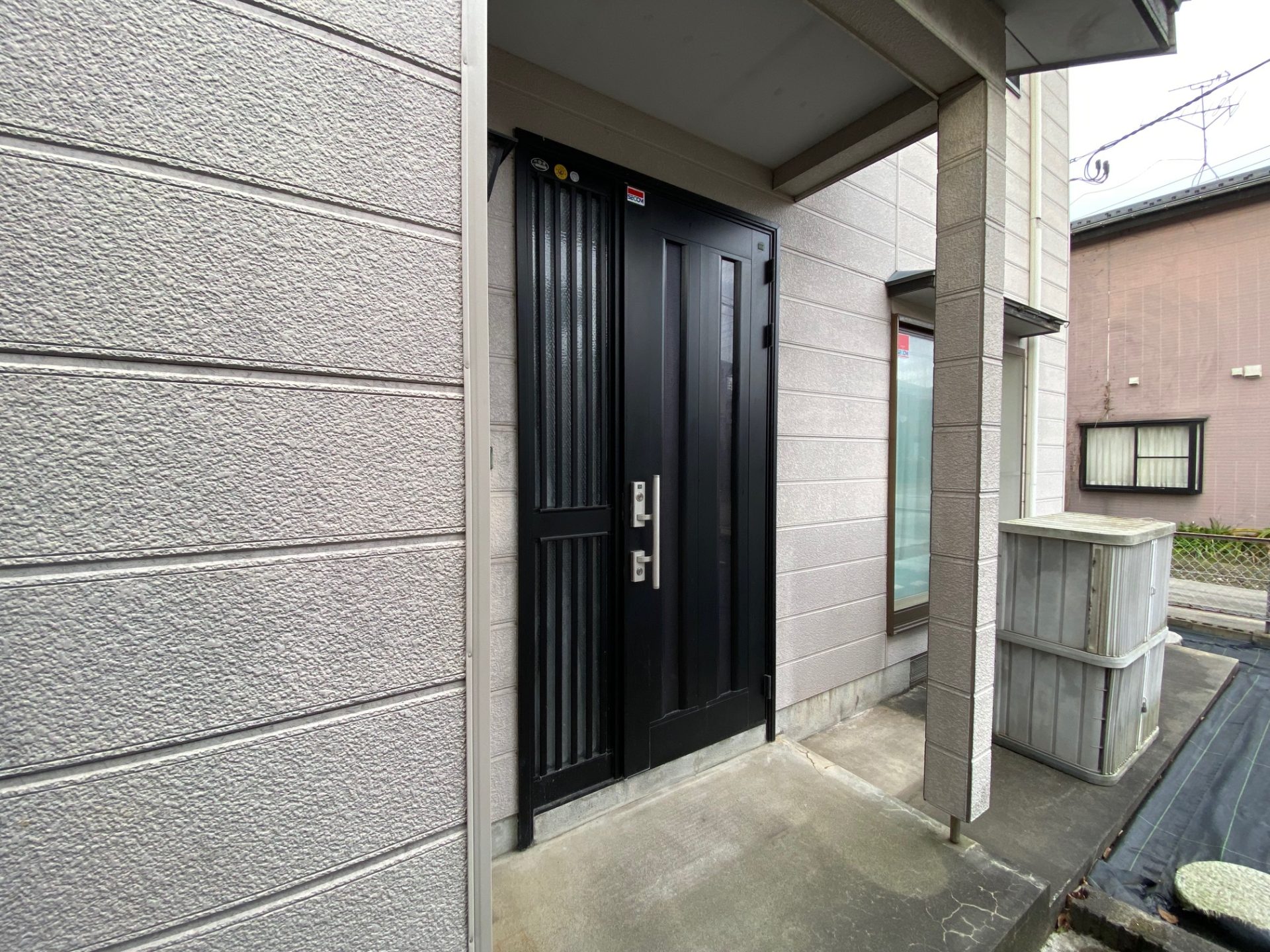 新潟市　断熱玄関ドアへリフォームの施工事例