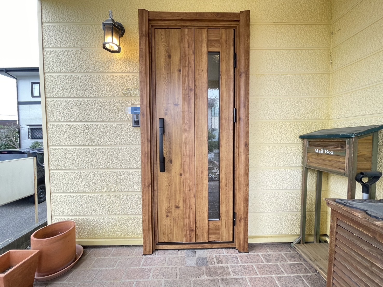 【新潟市の施工実例】YKKAPドアリモ玄関ドア　木製ドアから断熱ドアへリフォームの施工事例