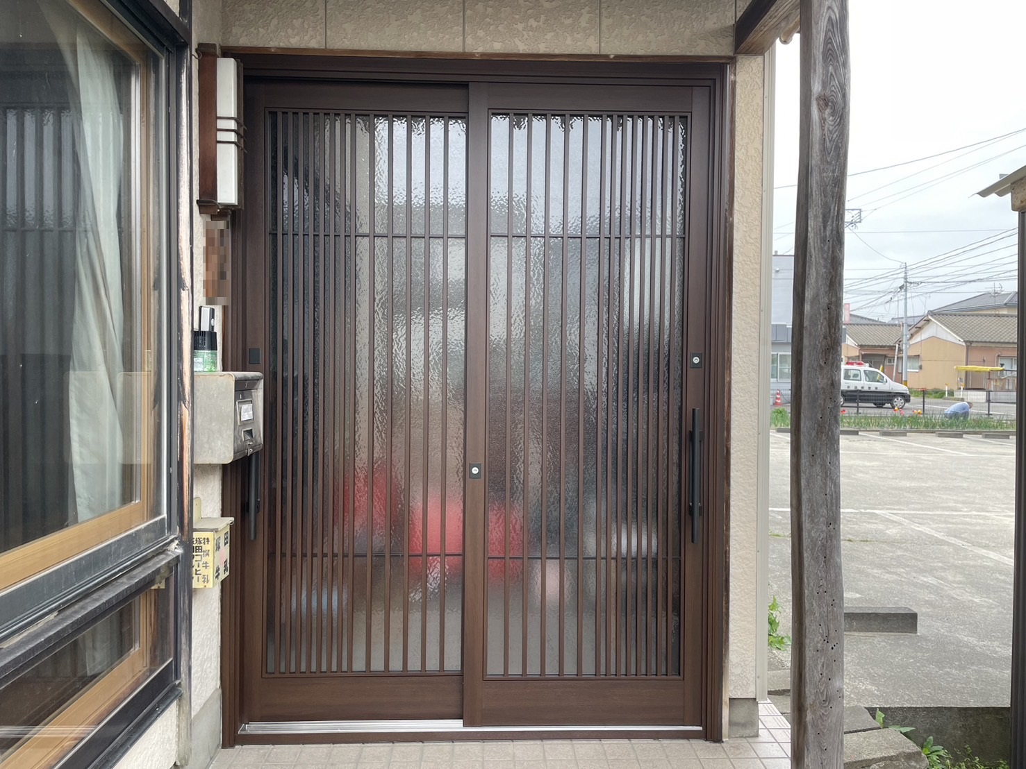 【新潟市の施工実例】YKKAPドアリモ　玄関引戸の交換でお家の印象が変わるの施工事例