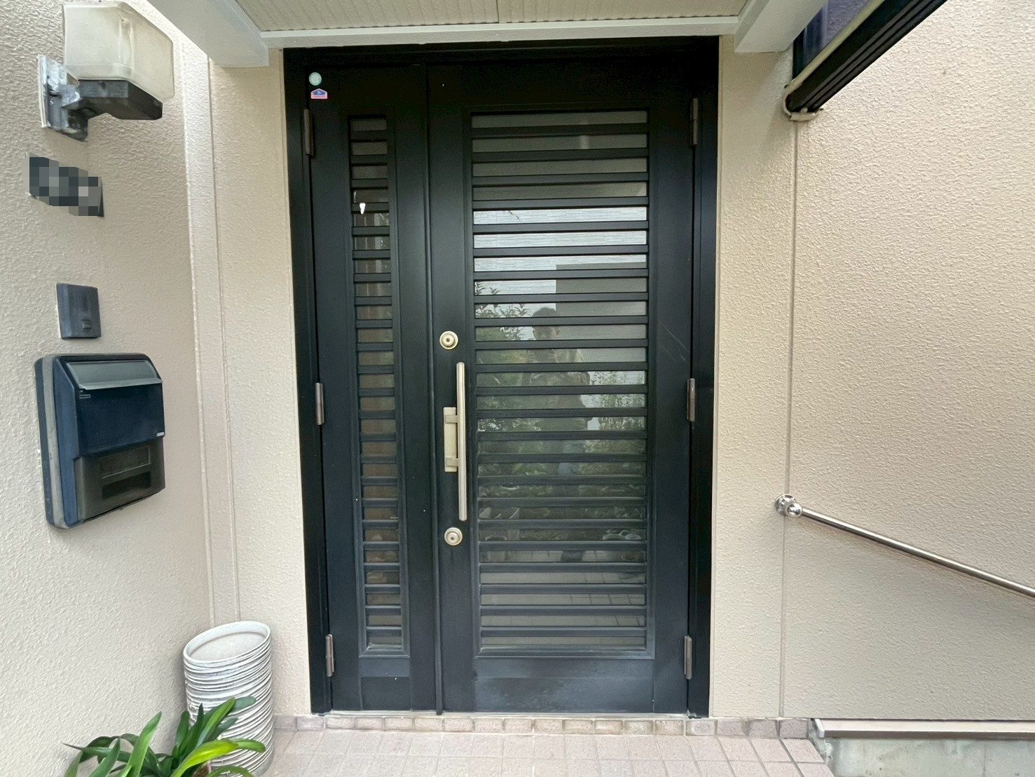 【長岡市】スマートコントロールキーで便利な玄関に YKKAPドアリモC07の施工事例